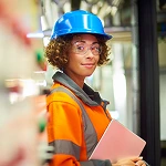 Logistics Worker in Warehouse Woman managing logistics in a warehouse